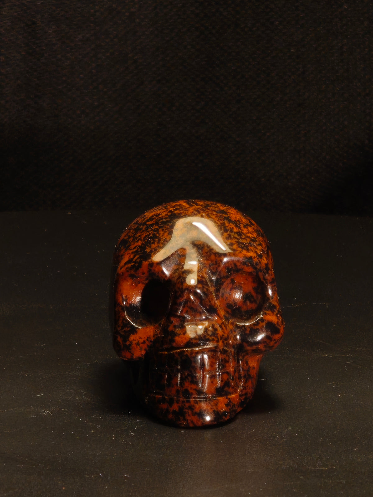 gepolijste aardse mahonie obsidiaan miniatuur schedel
